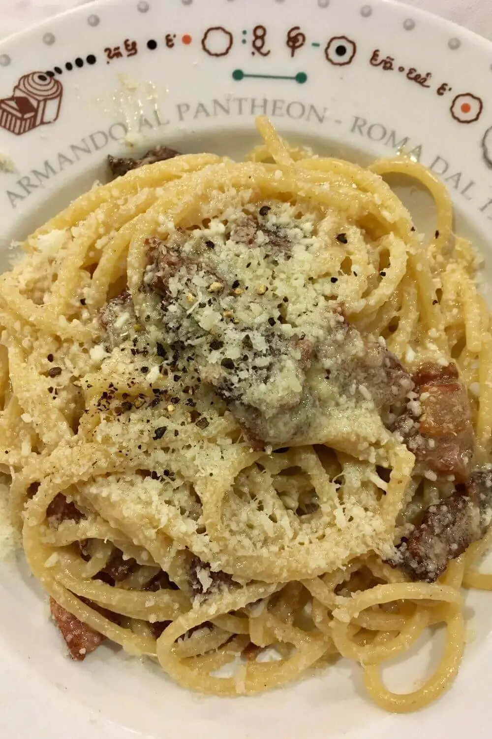 Roscioli Salumeria con Cucina signature dishes Spaghetti alla CarbonaraCacio e PepeBurrata with Sun-Dried Tomatoes
